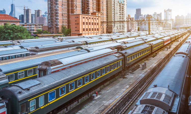 Trains At Railroad Station